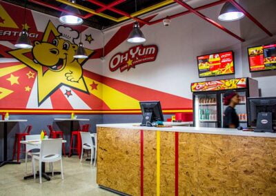 inside of a take away business with colourful branding