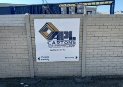 apl cartons branding against a wall