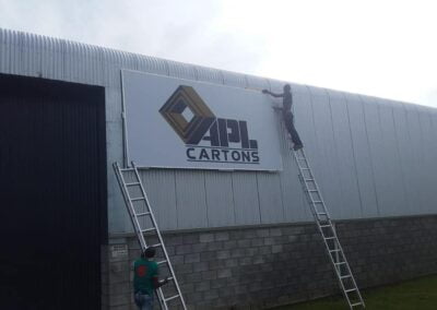 installation of branding on a wall