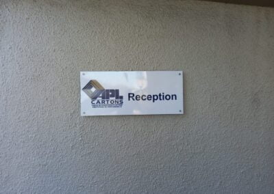 reception signage on a wall